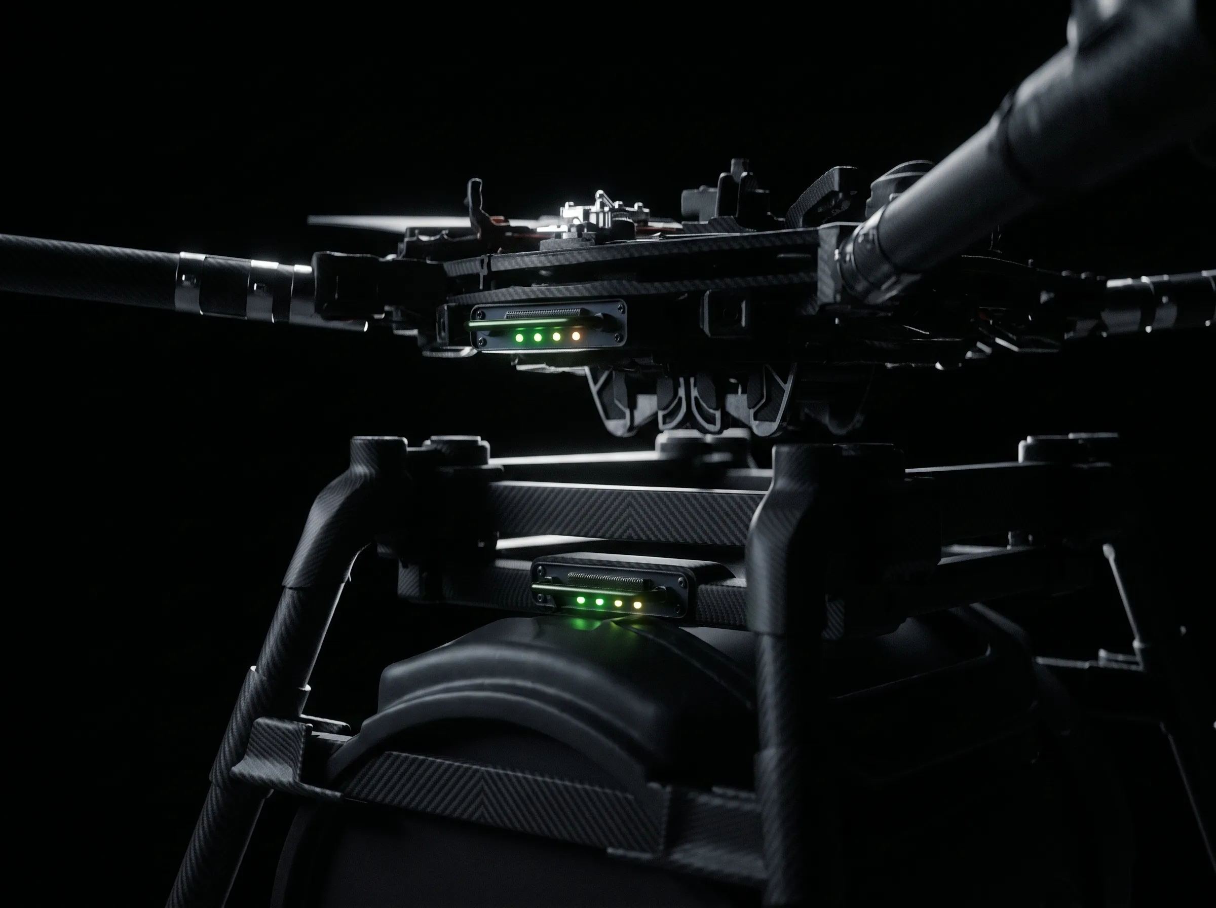 Close-up on the aircraft attachment connector, indicator lights showing battery charge