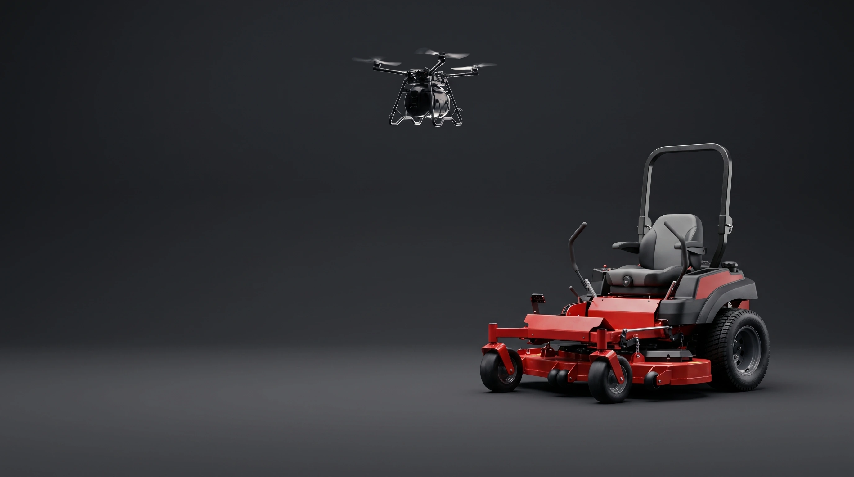 Small drone hovering high in frame beside a large riderless commercial lawn mower, on a dark studio backdrop
