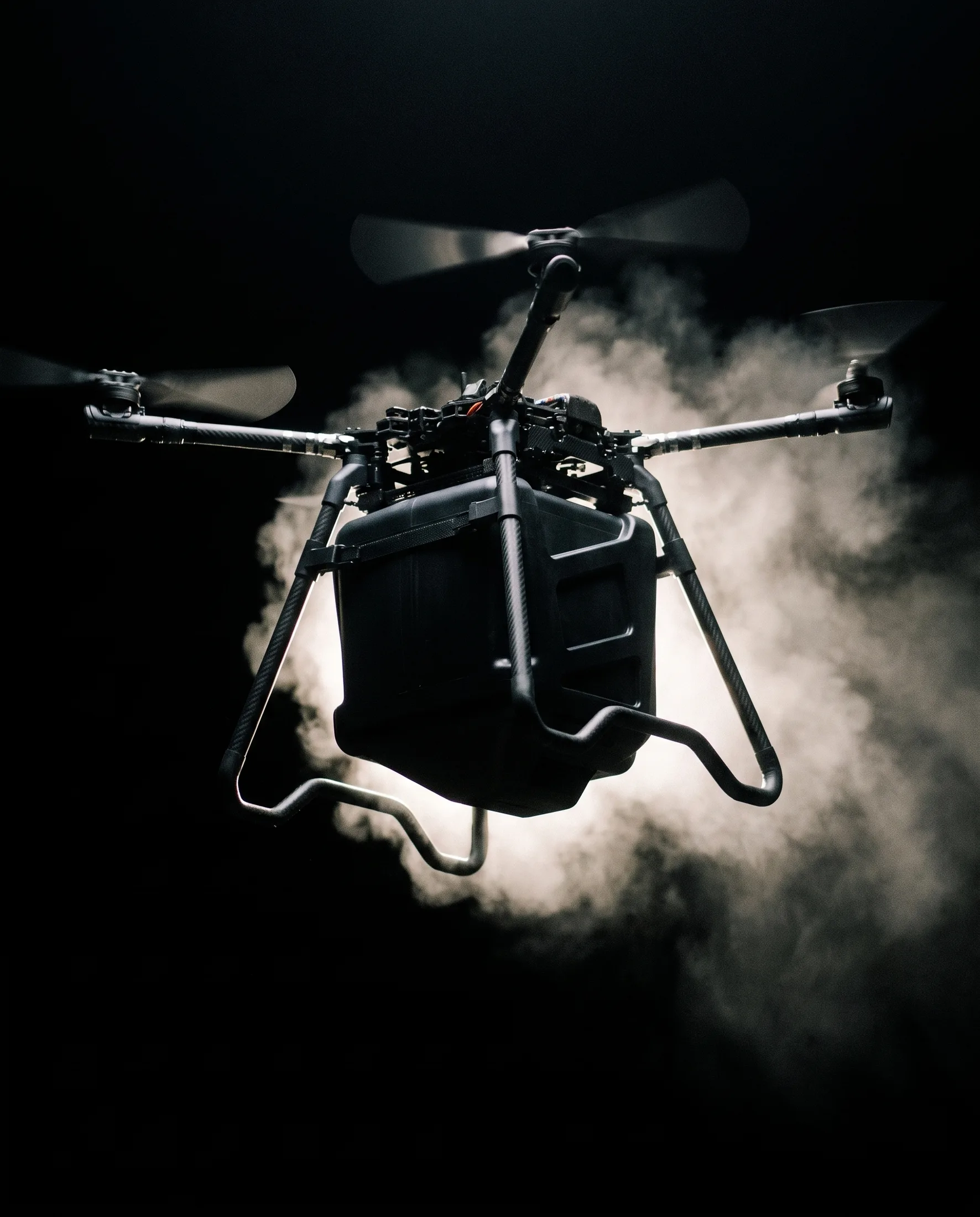 Fogger-equipped drone in flight